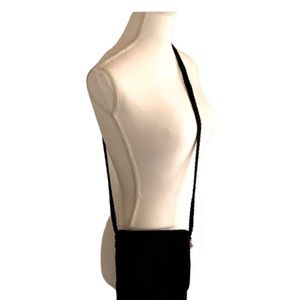 The Sak Mini Crossbody Crochet Bag in Black with Flap Front & Zip Closure